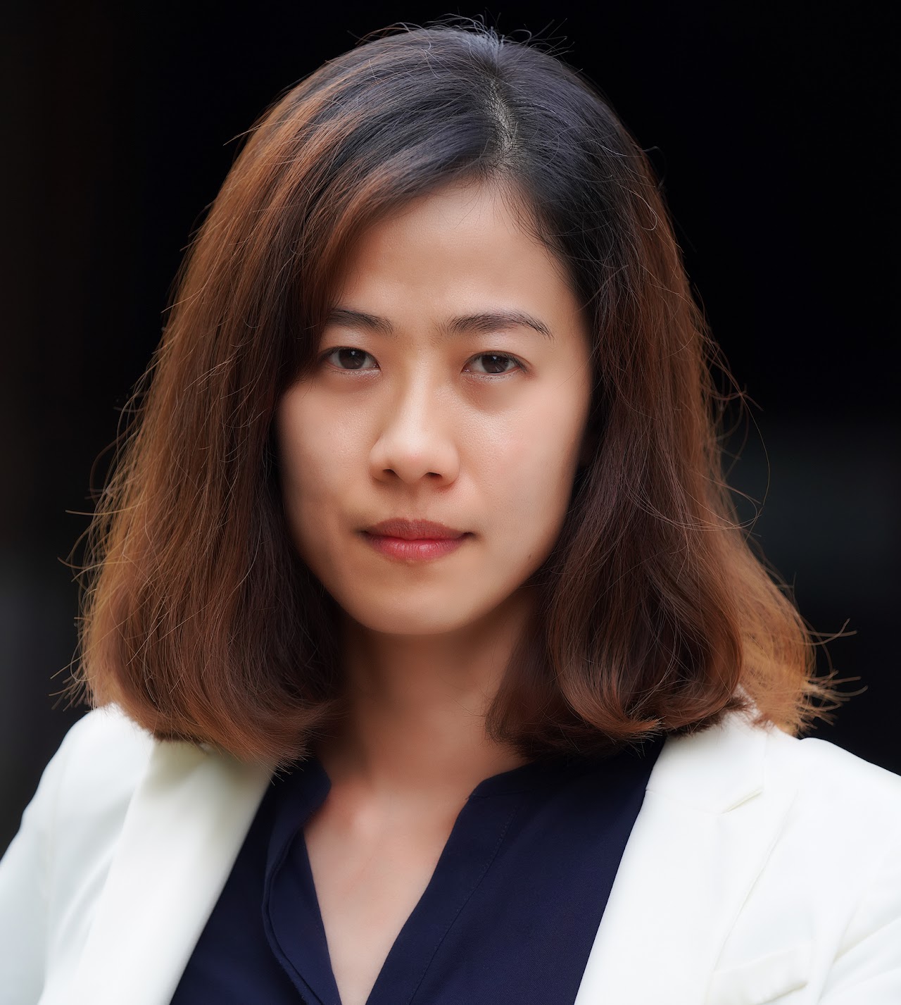 Headshot of Dr.Surphanit Piyapromdee (UCL)